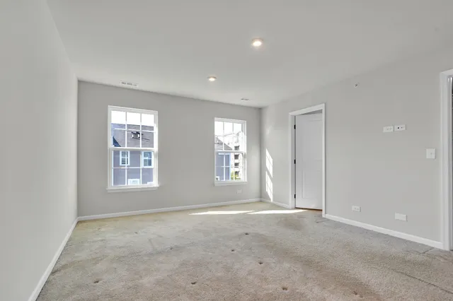 an empty room with windows