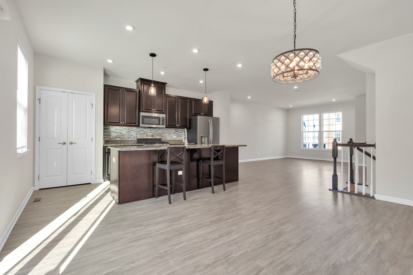 773 Rockwell Lane Des Plaines, IL 60016 - Photo 8 of 22 a view of a kitchen with a sink a refrigerator and a stove