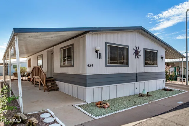 a front view of a house with garage
