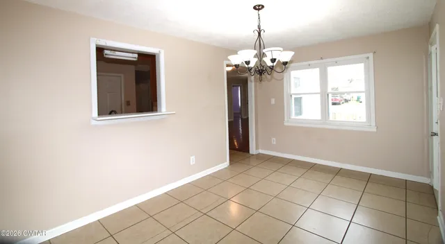 a bathroom with a shower and a toilet