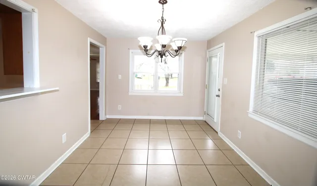 a view of a livingroom with a large window