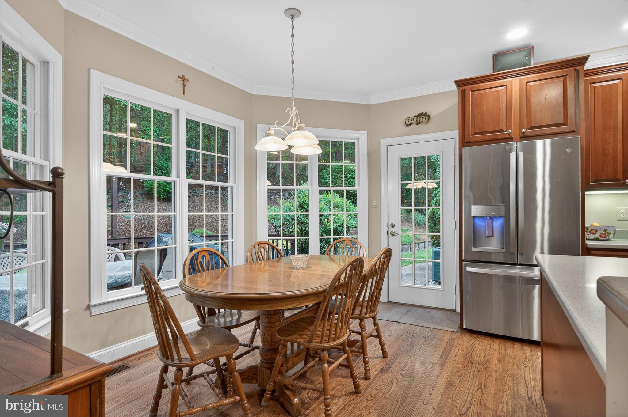 6601 Colchester Road Fairfax Station, VA 22039 - Photo 21 of 78 a view of a dining room with furniture window and outside view
