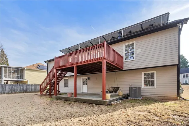 a view of empty room with wooden ceiling