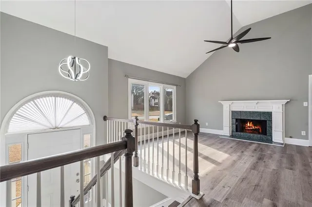 a view of livingroom with furniture and a fireplace