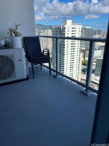 a view of a chairs and table in a room