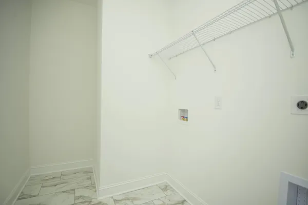 a kitchen with a sink stove and refrigerator