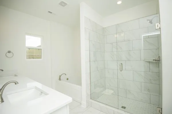 a large kitchen with kitchen island a sink stainless steel appliances and cabinets