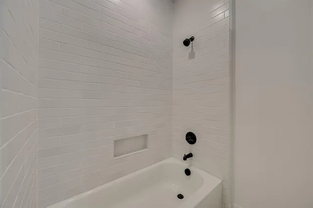 a bathroom with a bathtub