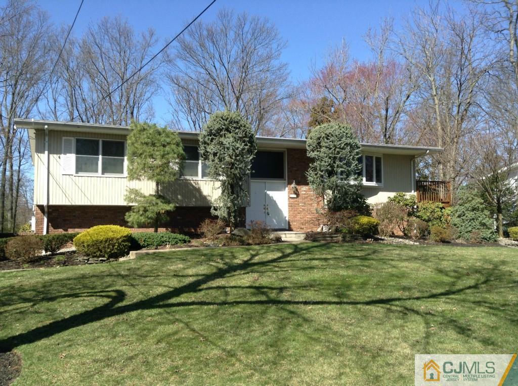 14 Bradford Road Edison, NJ 08820 - Photo 1 of 20 a front view of a house with garden