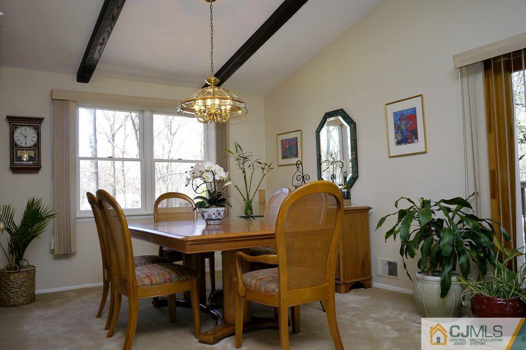 14 Bradford Road Edison, NJ 08820 - Photo 5 of 20 a dining room with furniture and window