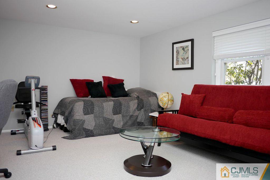 14 Bradford Road Edison, NJ 08820 - Photo 10 of 20 a living room with furniture and a couch