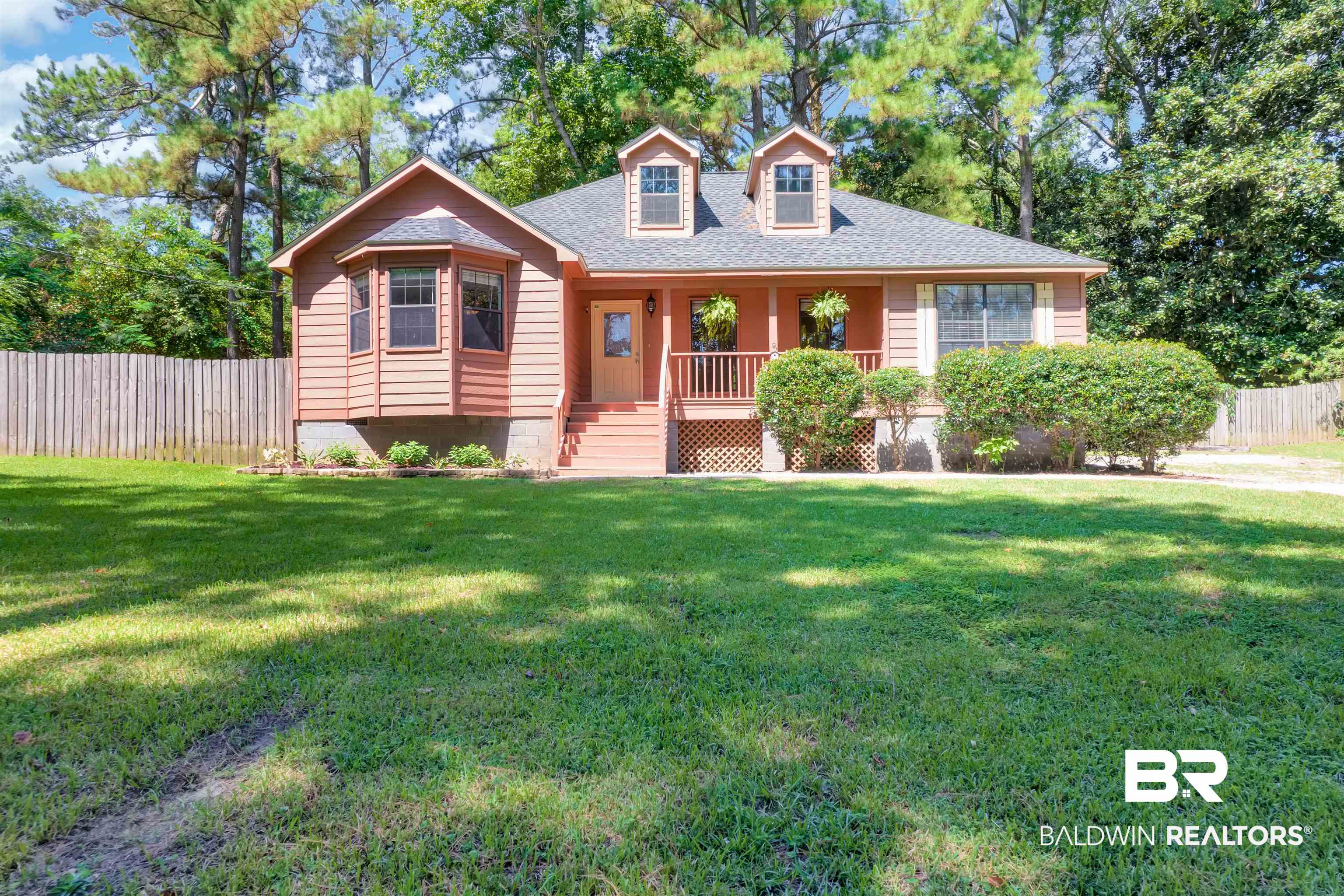 30871 Stanton Road Spanish Fort, AL 36527 - Photo 1 of 35 New england style home featuring a front yard