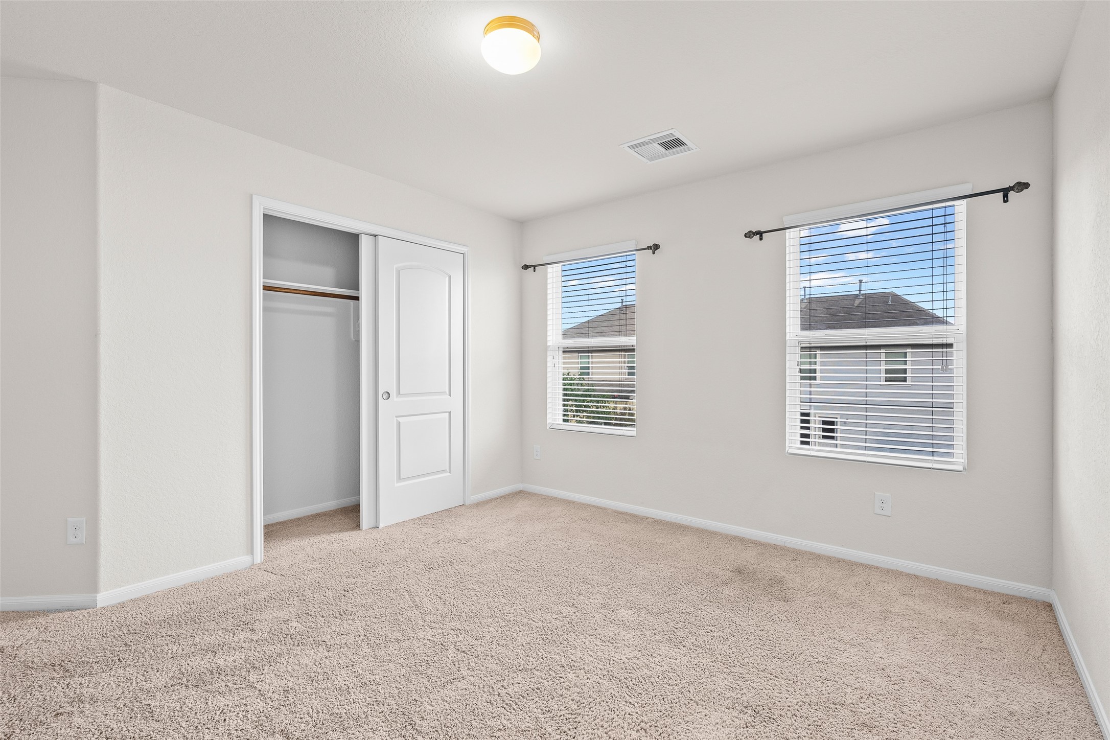3326 Coopers Ridge Way Houston, TX 77084 - Photo 11 of 17 a view of an empty room with a window