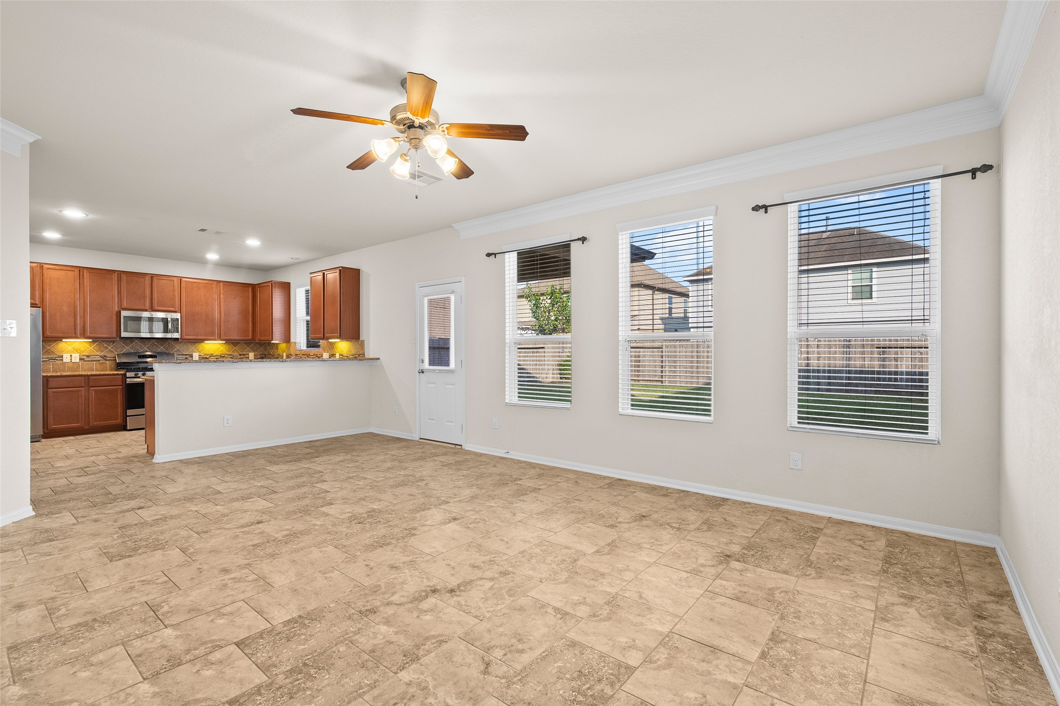 3326 Coopers Ridge Way Houston, TX 77084 - Photo 5 of 17 a view of an empty room with a window