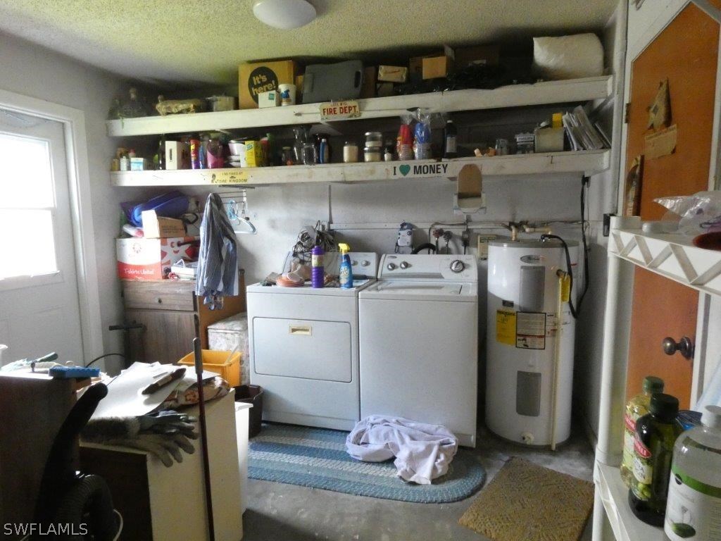 18555 Geranium Road Fort Myers, FL 33967 - Photo 24 of 25 a room with storage and utility