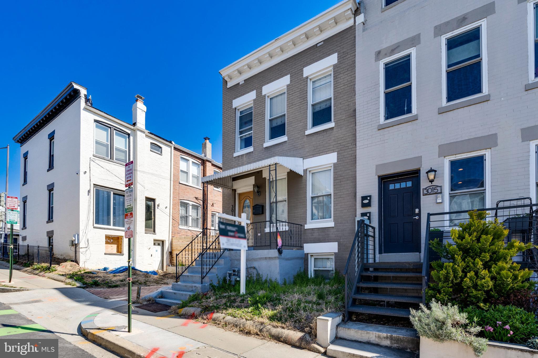 3017 Warder Street Northwest Washington, DC 20001 - Photo 1 of 14 a front view of a building with street view
