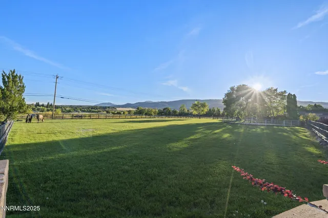a view of a golf course with a lake