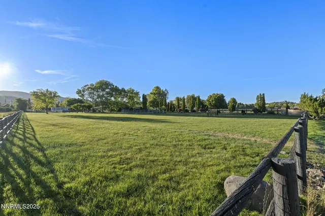 a view of a lake with a yard