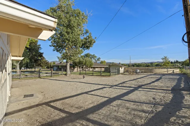 a view of a street with houses