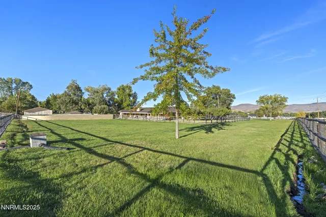 a view of a golf course with a lake