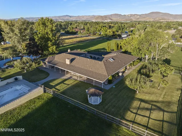 an aerial view of a house with a garden
