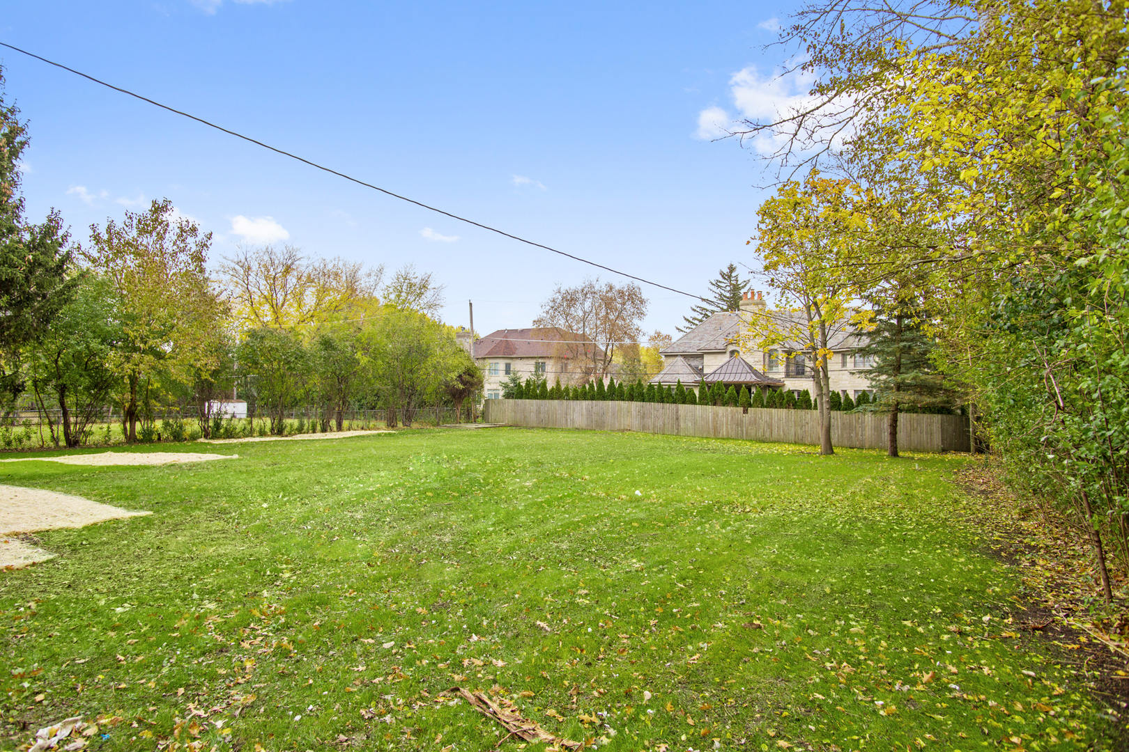 715 Anthony Trail Northbrook, IL 60062 - Photo 19 of 20 a view of a field of grass and trees