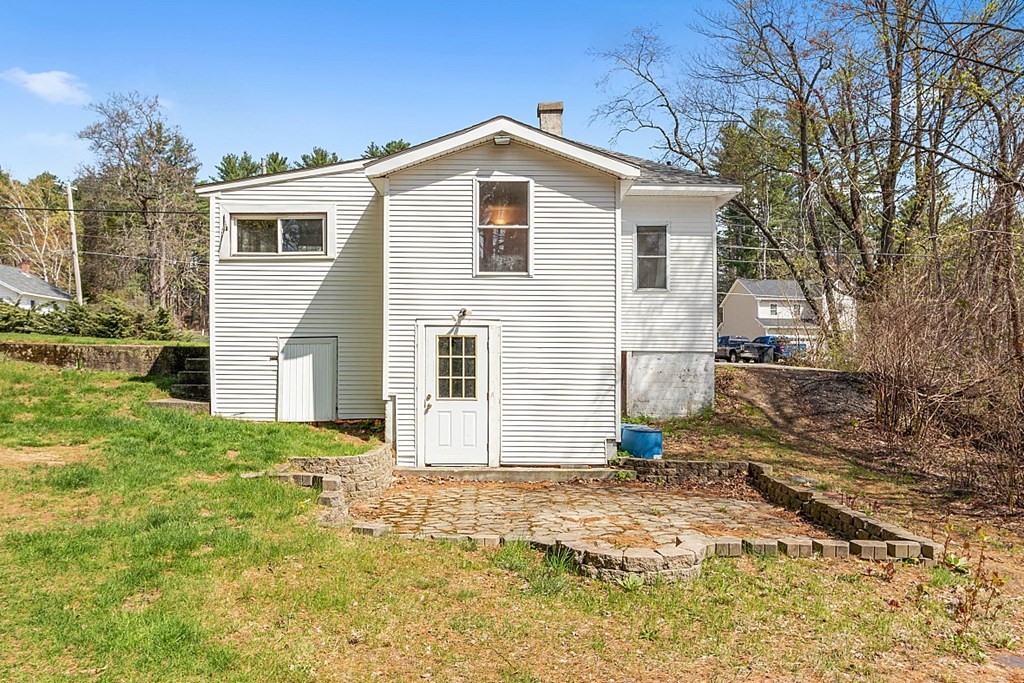 250 Brookside Road Orange, MA 01364 - Photo 25 of 30 a front view of a house with a yard