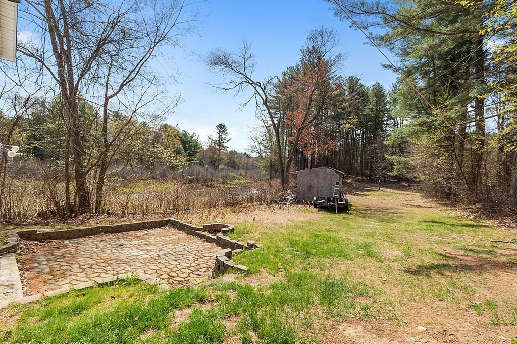250 Brookside Road Orange, MA 01364 - Photo 29 of 30 a view of a yard with a tree
