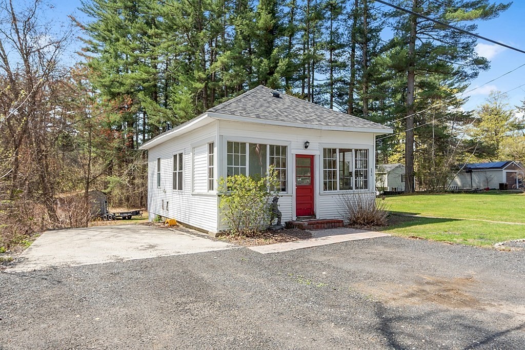 250 Brookside Road Orange, MA 01364 - Photo 3 of 30 a view of a house with a yard and large tree