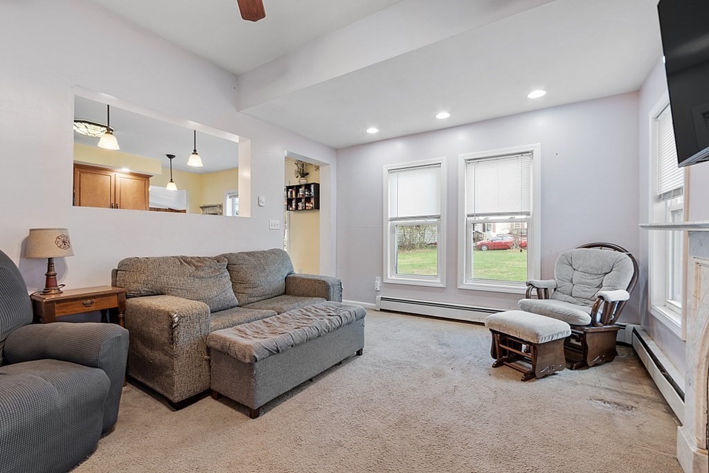 250 Brookside Road Orange, MA 01364 - Photo 6 of 30 a living room with furniture and a window