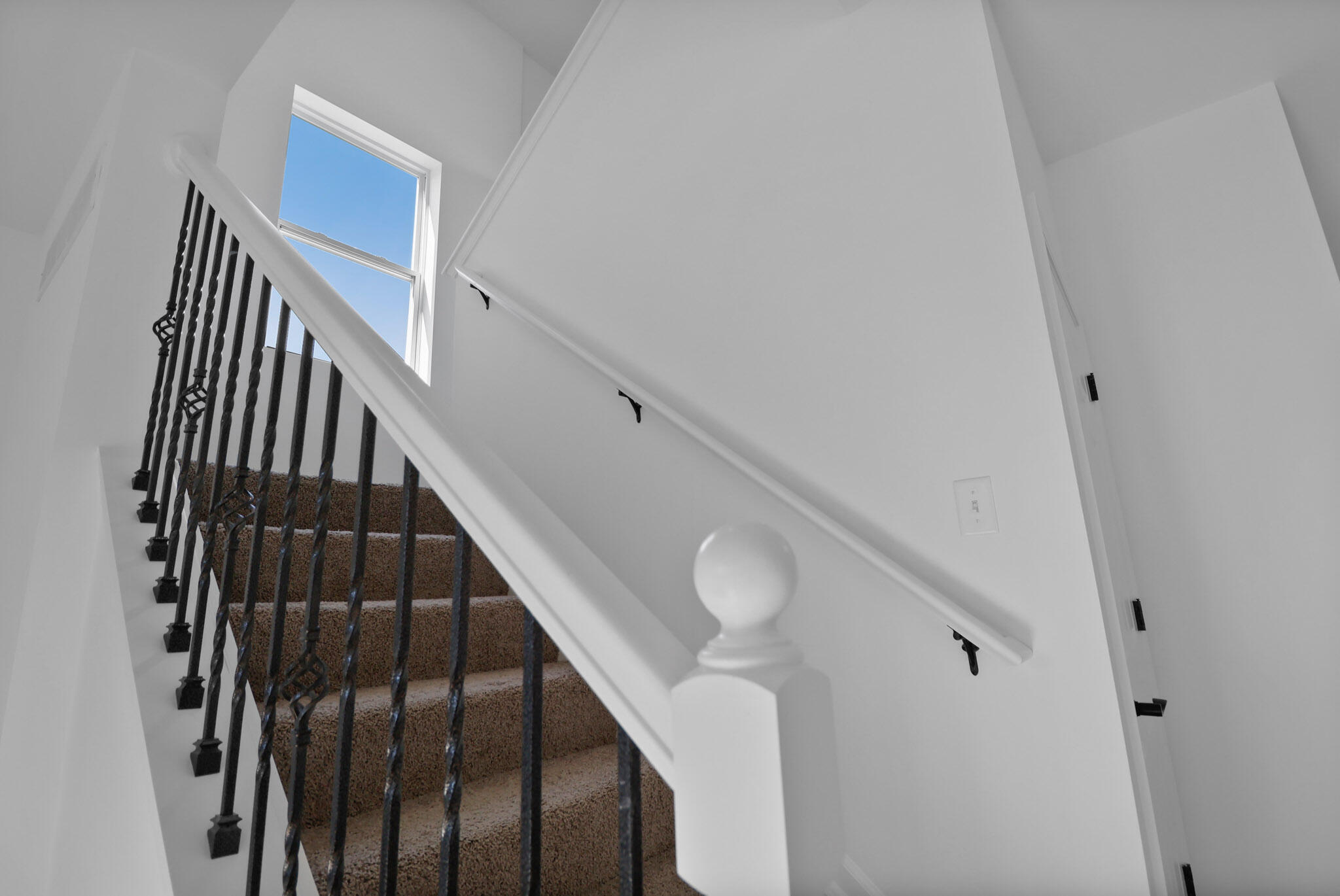 10410 California Street Crown Point, IN 46307 - Photo 10 of 24 a view of staircase with wooden floor and white walls