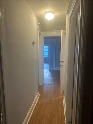 a view of staircase with lots of white walls