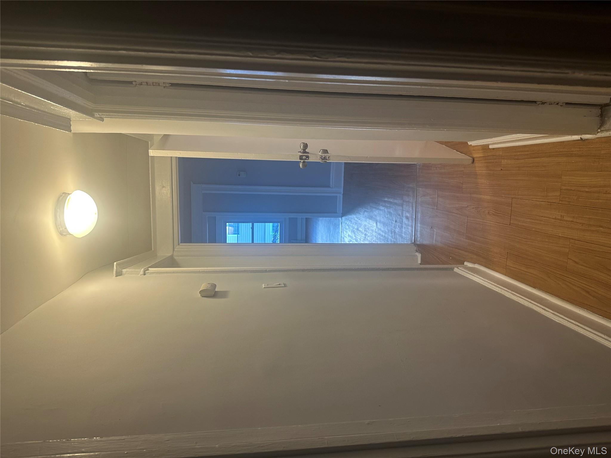 4 Ritters Lane Yonkers, NY 10703 - Photo 39 of 41 a view of a hallway with wooden floor