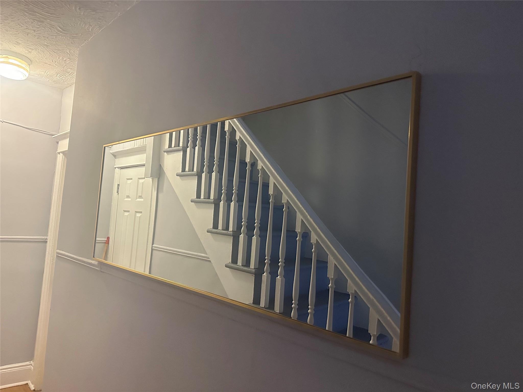 4 Ritters Lane Yonkers, NY 10703 - Photo 41 of 41 a view of staircase with lots of white walls