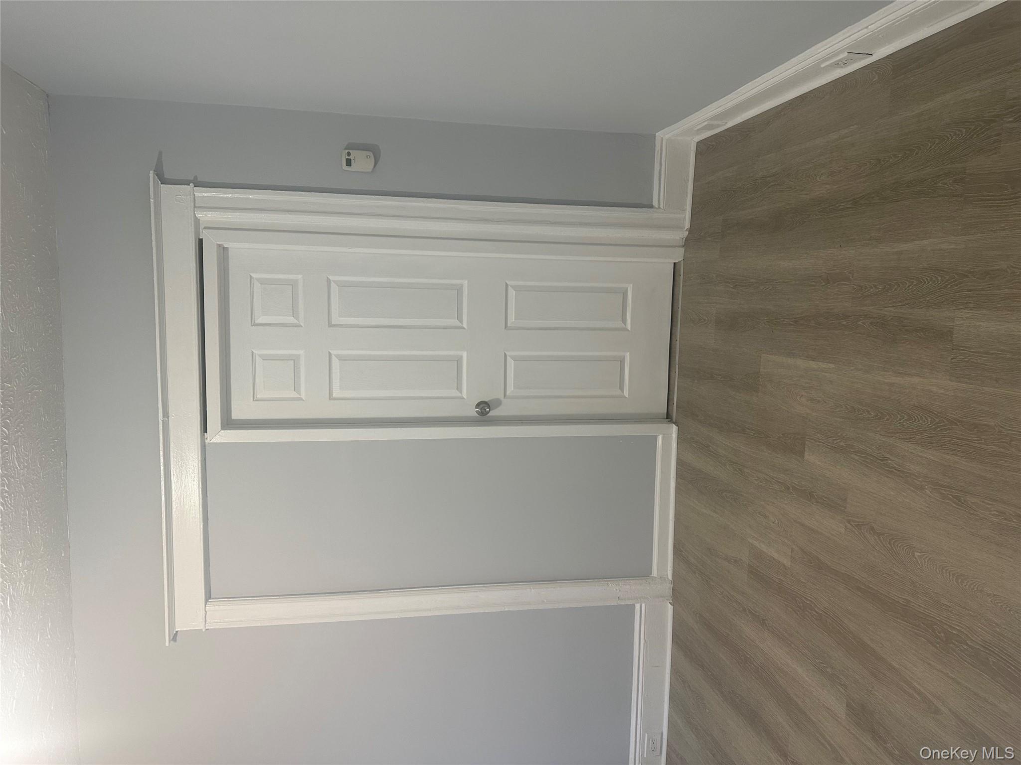 4 Ritters Lane Yonkers, NY 10703 - Photo 6 of 41 a view of an empty room with wooden floor