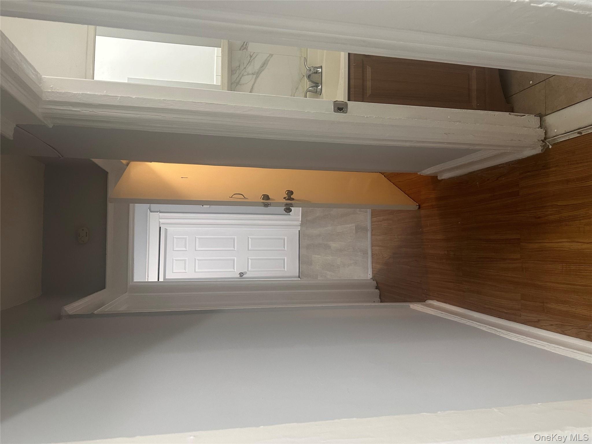 4 Ritters Lane Yonkers, NY 10703 - Photo 10 of 41 a view of a bathroom from a hallway