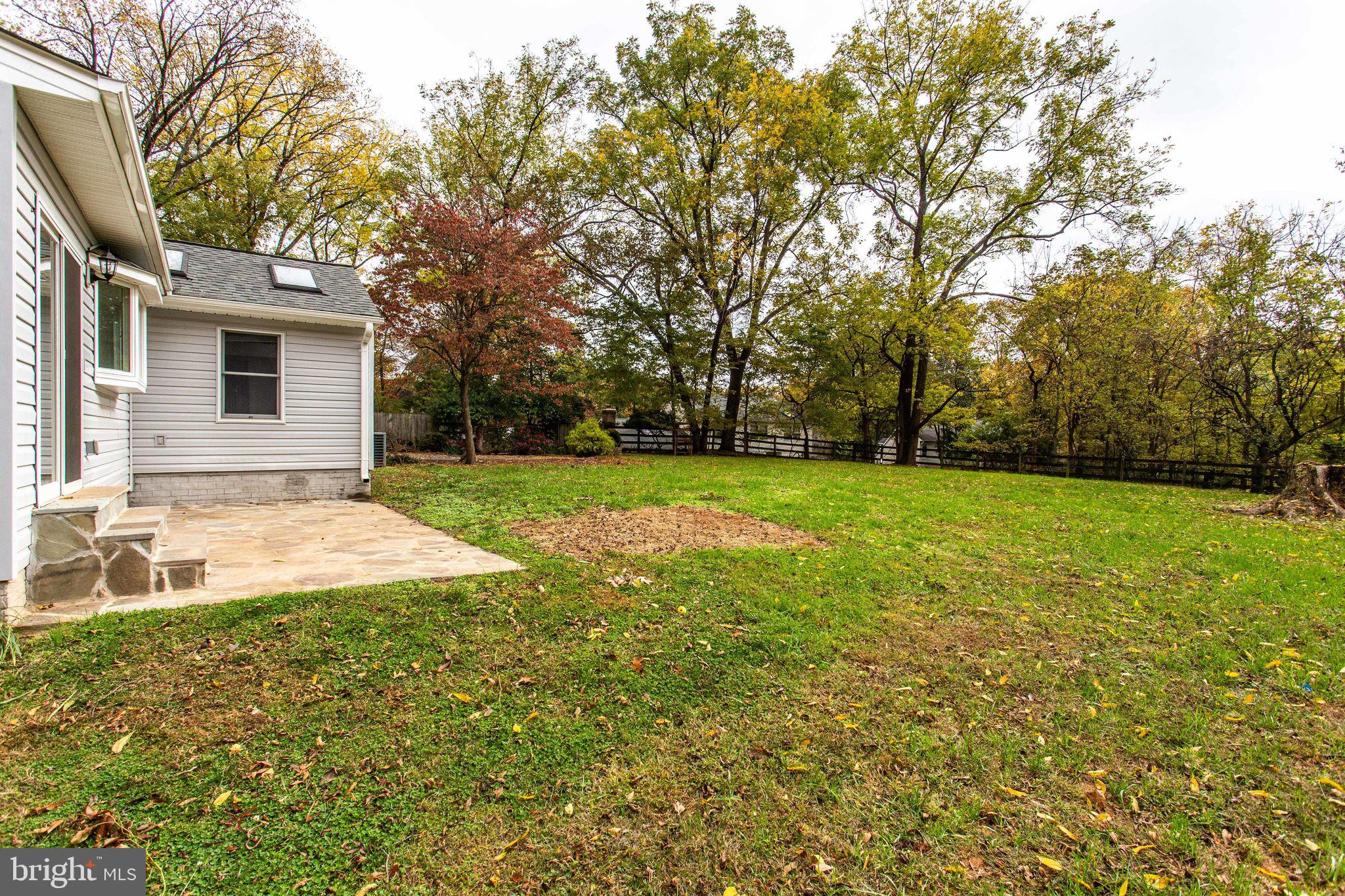 9713 Clarks Crossing Road Vienna, VA 22182 - Photo 36 of 36 Patio & Huge, Lush Backyard