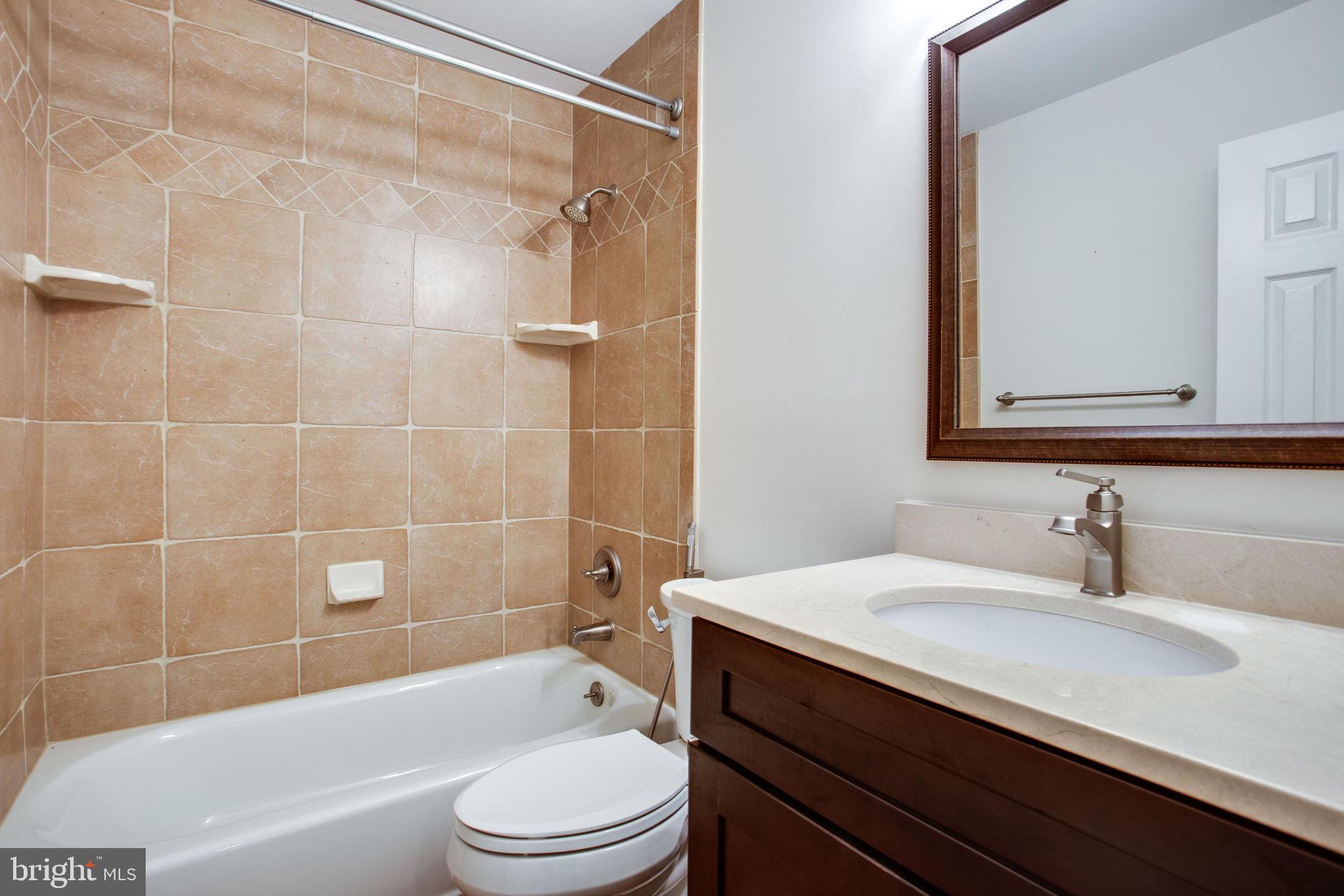 9713 Clarks Crossing Road Vienna, VA 22182 - Photo 8 of 36 Updated Main Floor Full Bath