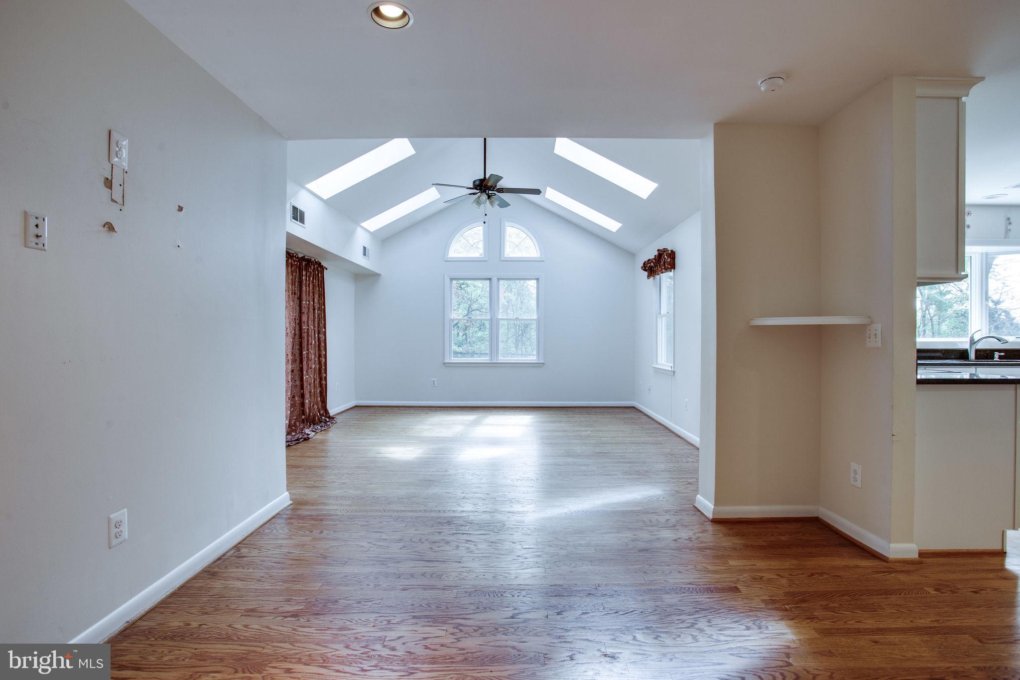 9713 Clarks Crossing Road Vienna, VA 22182 - Photo 9 of 36 Bright Family Room w/ Vaulted Ceiling & Skylights
