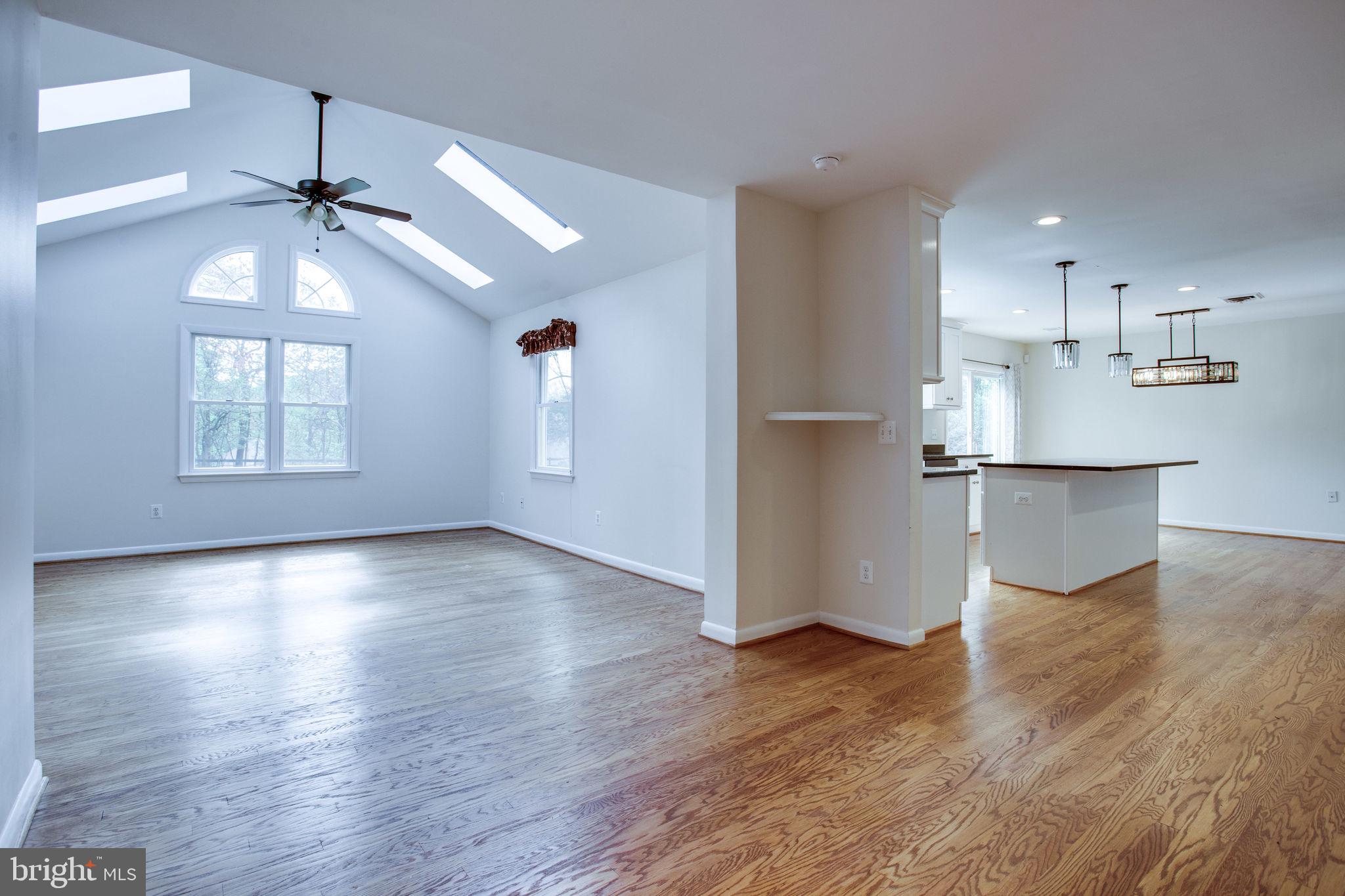 9713 Clarks Crossing Road Vienna, VA 22182 - Photo 10 of 36 Open Family Room and Kitchen Layout
