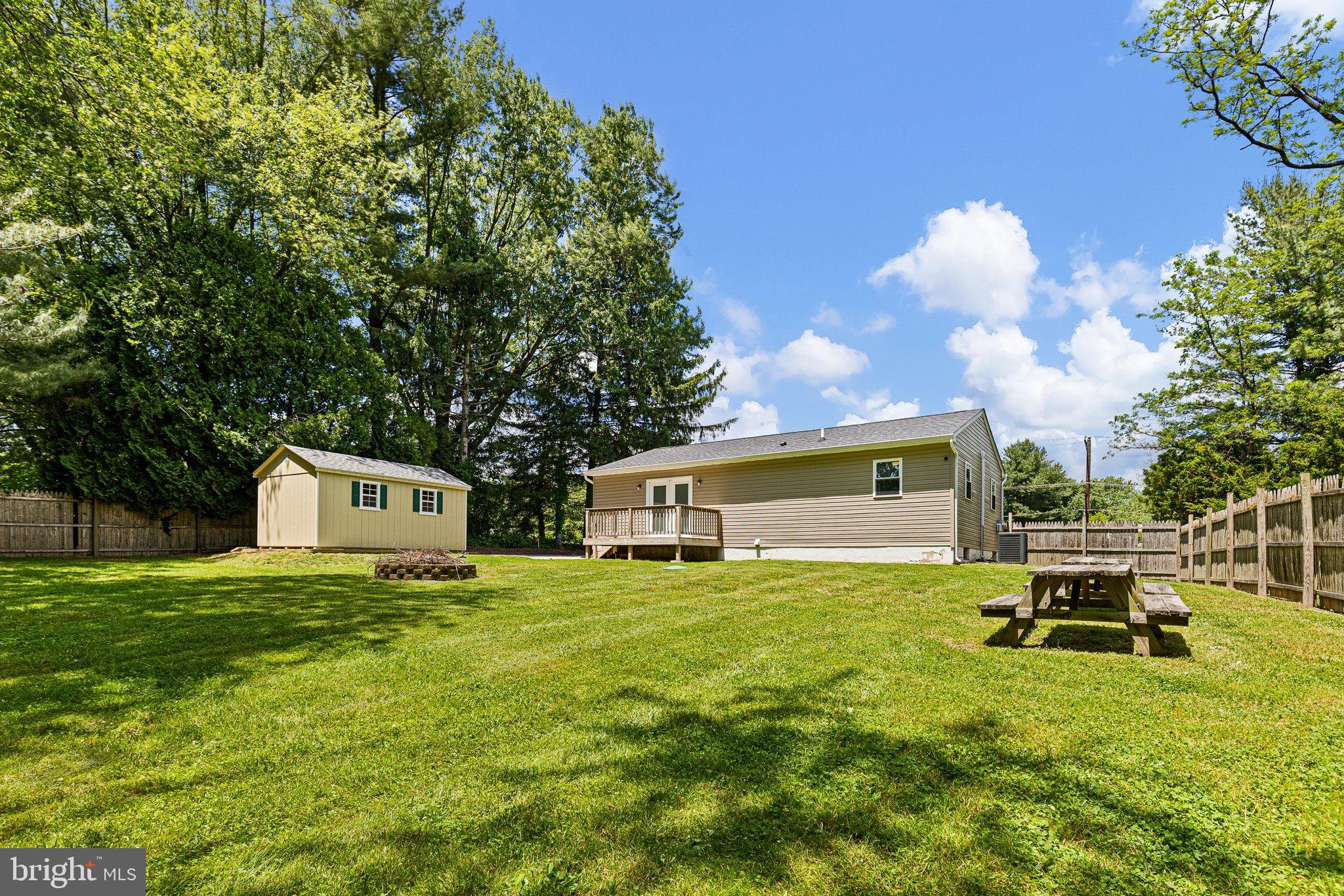 370 Big Elk Chapel Road Elkton, MD 21921 - Photo 24 of 29 a house with garden in front of it