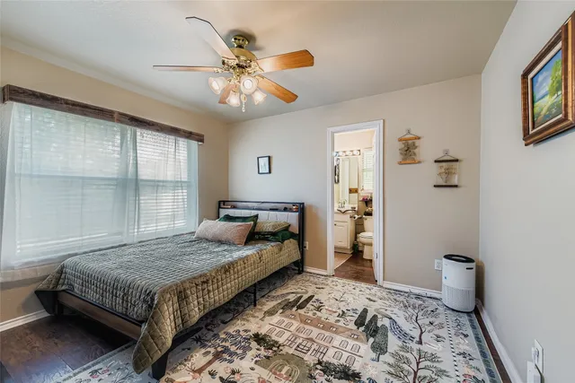 a view of a lake with houses in the back