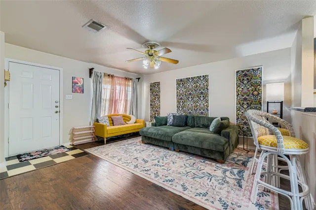 a white toilet sitting next to a bathroom sink