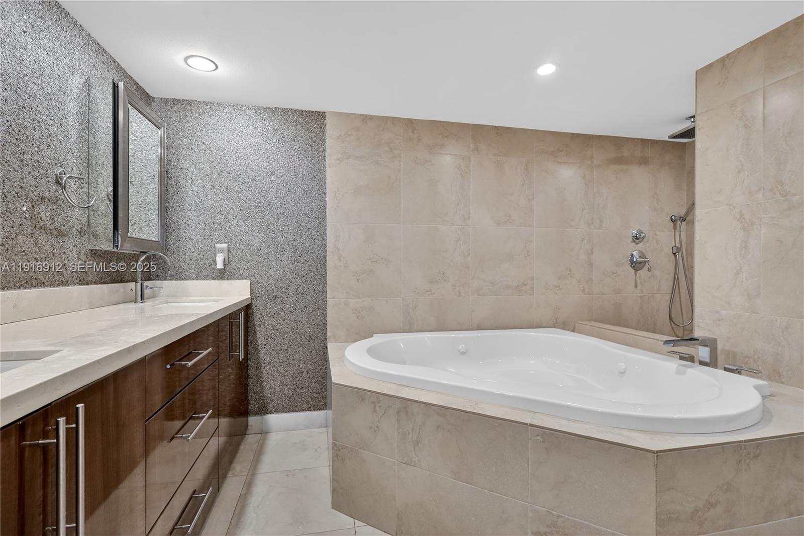 4000 Towerside Terrace, Unit 1612 Miami, FL 33138 - Photo 26 of 49 a bathroom with a bathtub and a sink