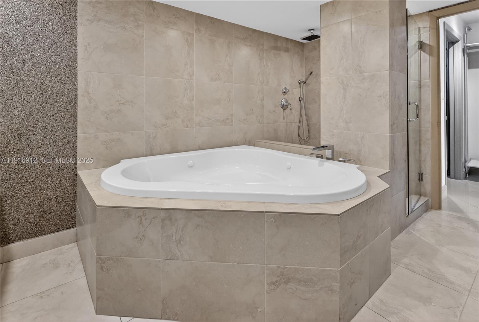 4000 Towerside Terrace, Unit 1612 Miami, FL 33138 - Photo 28 of 49 a bathroom with a bathtub