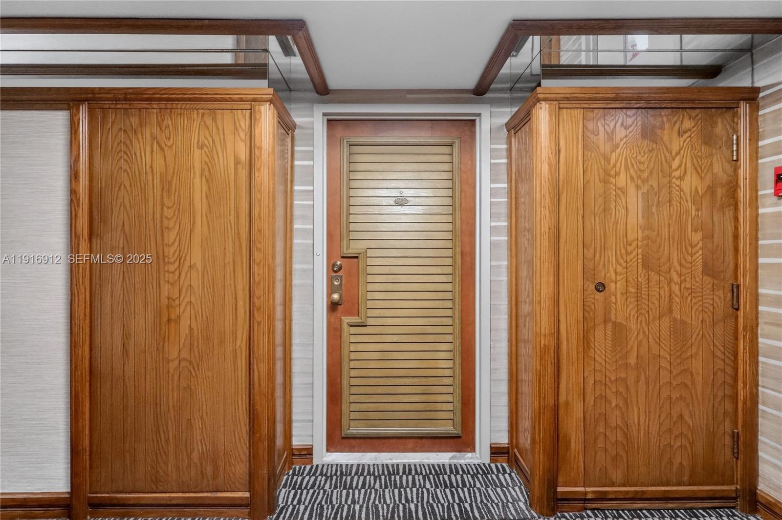 4000 Towerside Terrace, Unit 1612 Miami, FL 33138 - Photo 49 of 49 a view of a closet and utility room