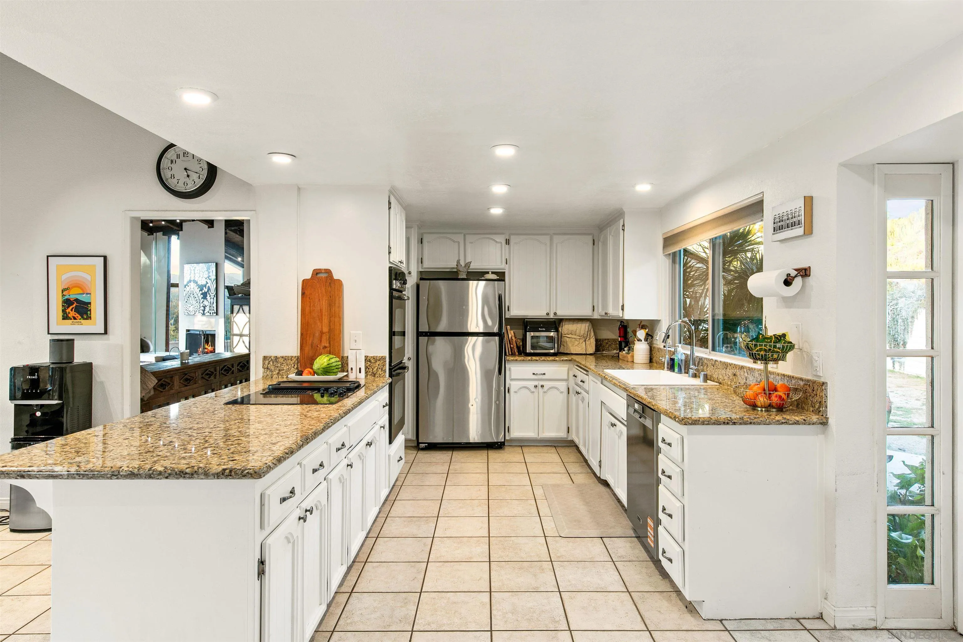 580-582 South Grade Road Alpine, CA 91901 - Photo 12 of 40 a kitchen with stainless steel appliances granite countertop a sink and cabinets