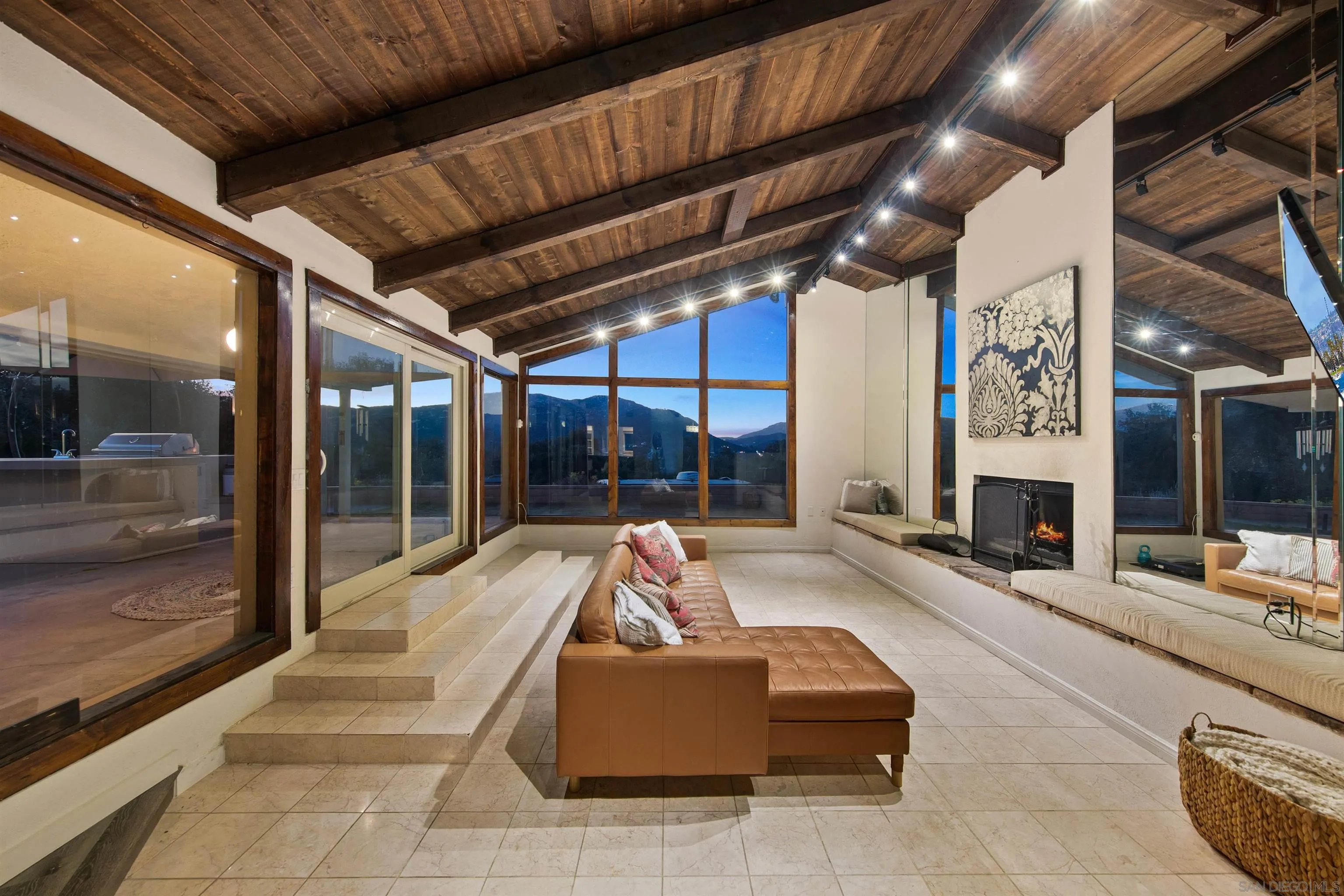 580-582 South Grade Road Alpine, CA 91901 - Photo 3 of 40 a living room with fireplace furniture and a floor to ceiling window
