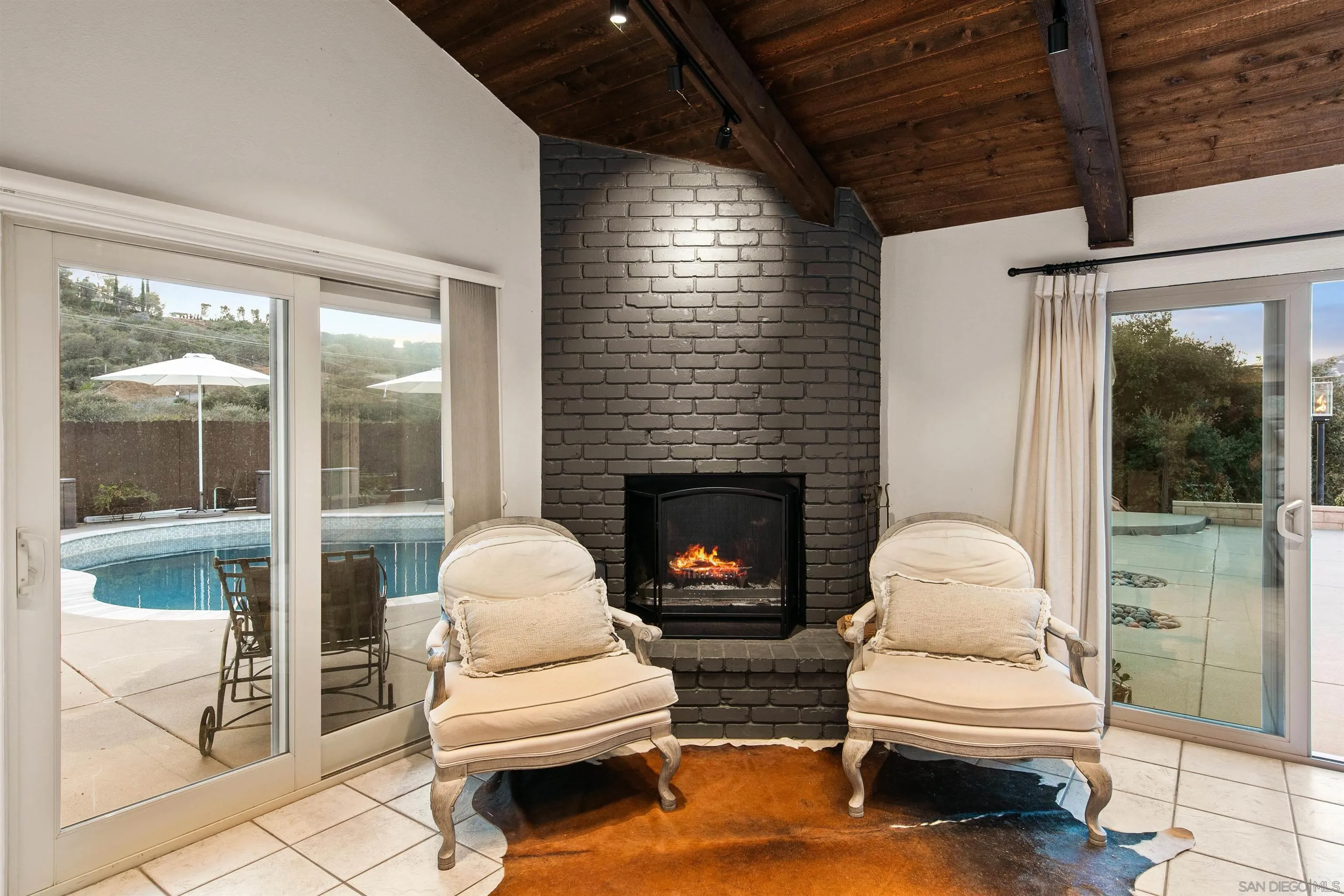 580-582 South Grade Road Alpine, CA 91901 - Photo 9 of 40 a living room with furniture and a fireplace