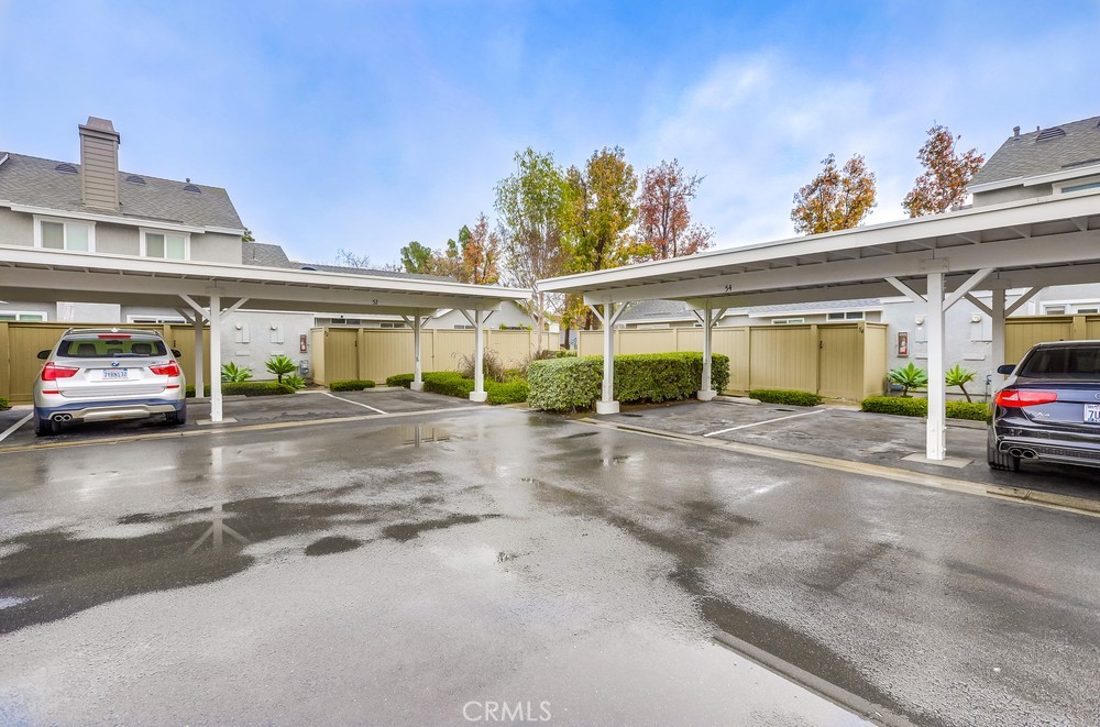 54 Eagle Run Irvine, CA 92614 - Photo 20 of 25 a car parked in front of a house